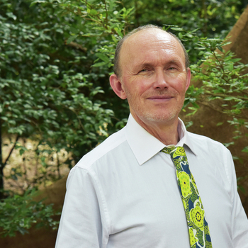 Professor Stephen Dobson in front of trees on campus.JPG