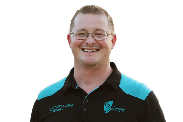 Headshot of Kurt Dunlop smiling wearing an Occupational Therapy placement polo shirt