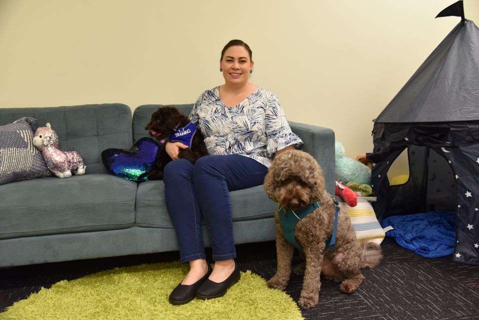 Megan Humphris with her therapy dogs Daisy and Monty.jpg