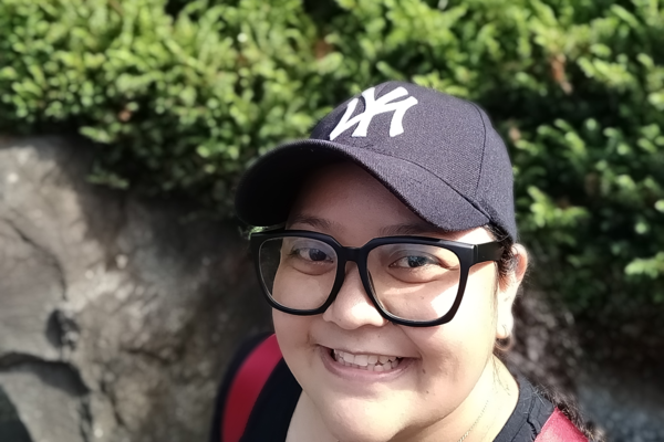 Filipino nursing student, Aireen Dia, smiling in nature