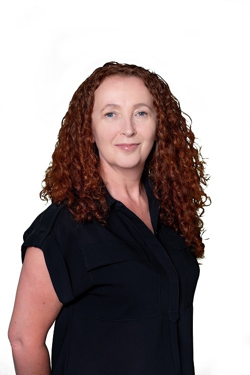 Dr Angela Capper smiling