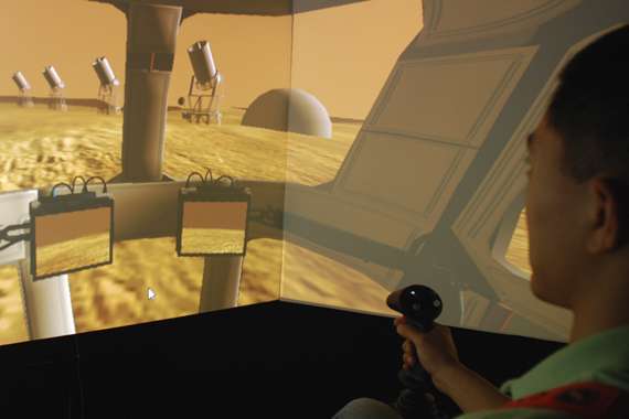 Researcher sitting in a space simulator