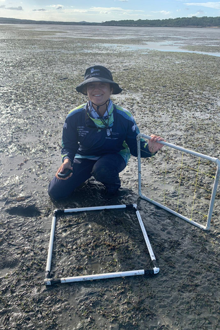 Andria Ostrowski science researcher in seagrass field