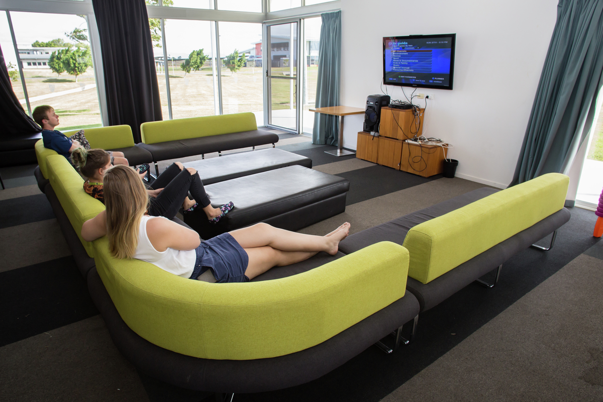 3 students in a communal lounge room in Canefield College in Mackay