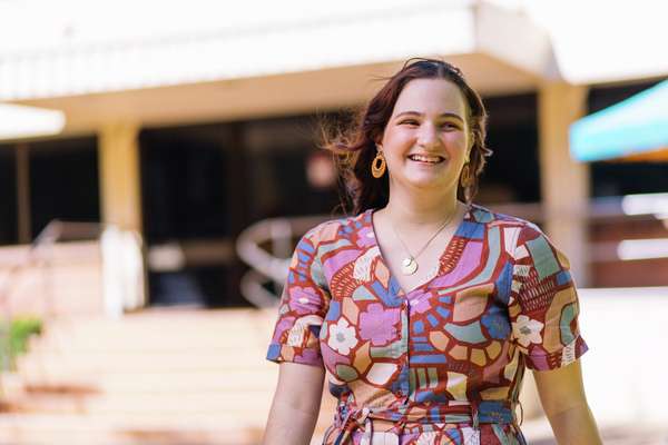 Cassidy Acutt smiling looking away