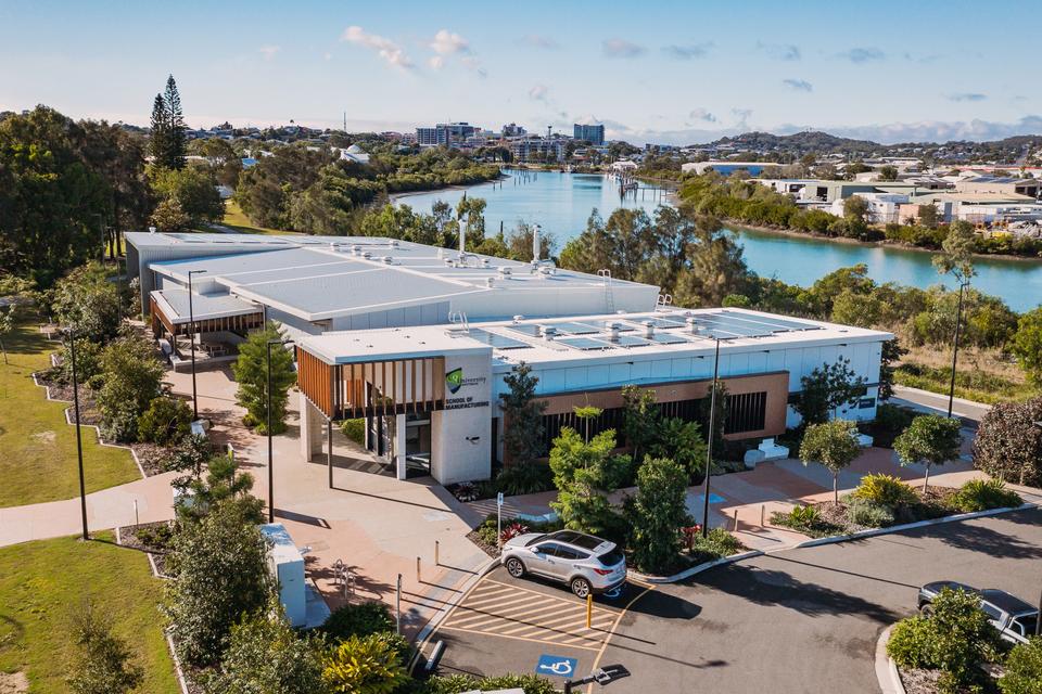 Aerial view of the Centre for Hydrogen and Renewable Energy building along the Gladstone Harbour