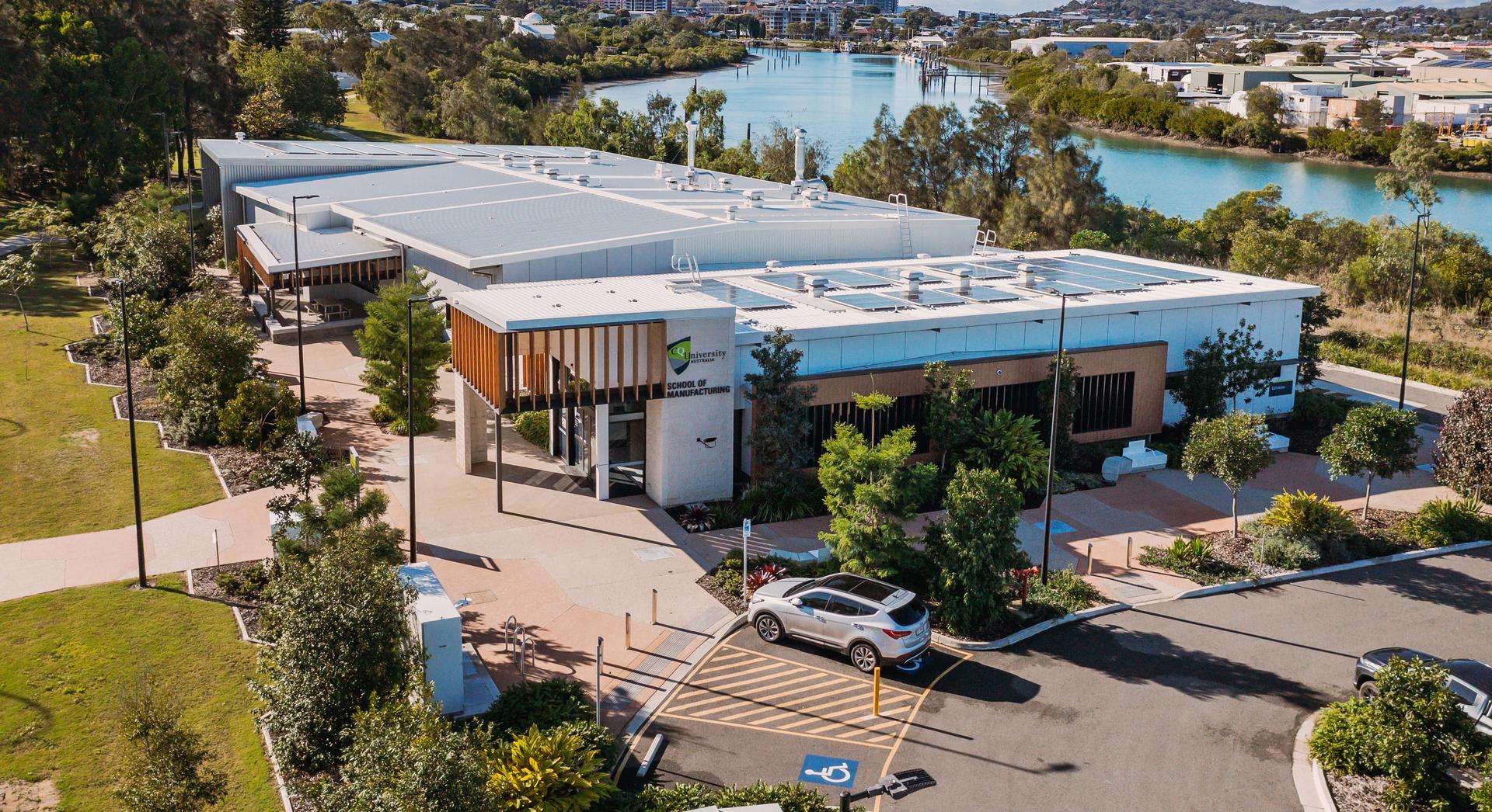 Aerial view of the Centre for Hydrogen and Renewable Energy building along the Gladstone Harbour