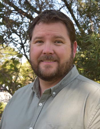 Headshot of Dr Corey Bloomfield