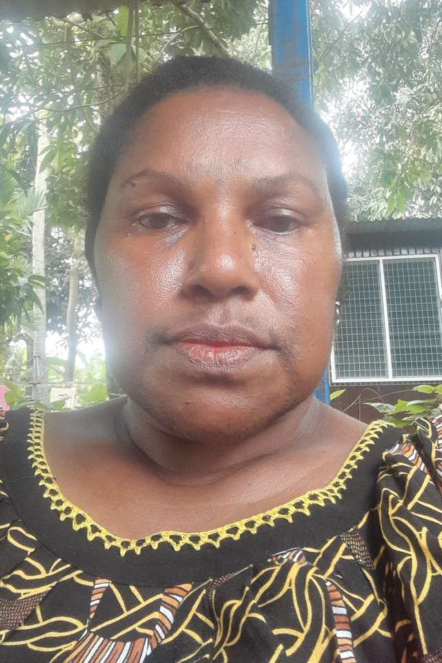 Alumna Danielah Ningakun outdoors wearing a print top