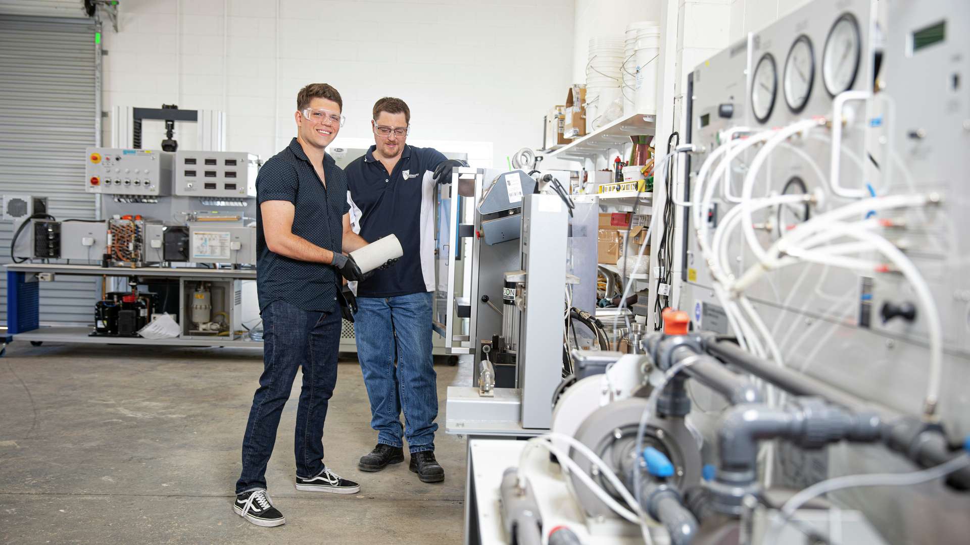 CQU Engineering students working with equipment on their placement.