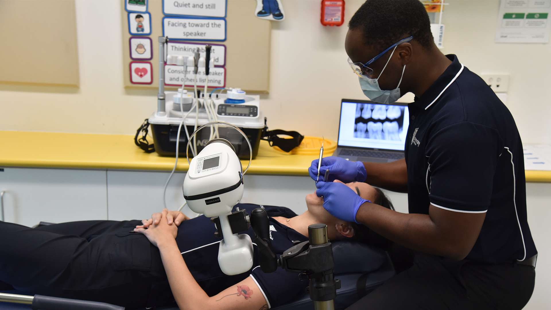 Dental patient is being examined by a dentist
