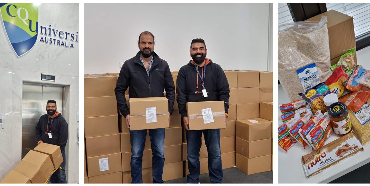 Karthik Arasu and Ritesh Chugh standing with boxes of groceries that include items such as noodles, lentils and chocolate