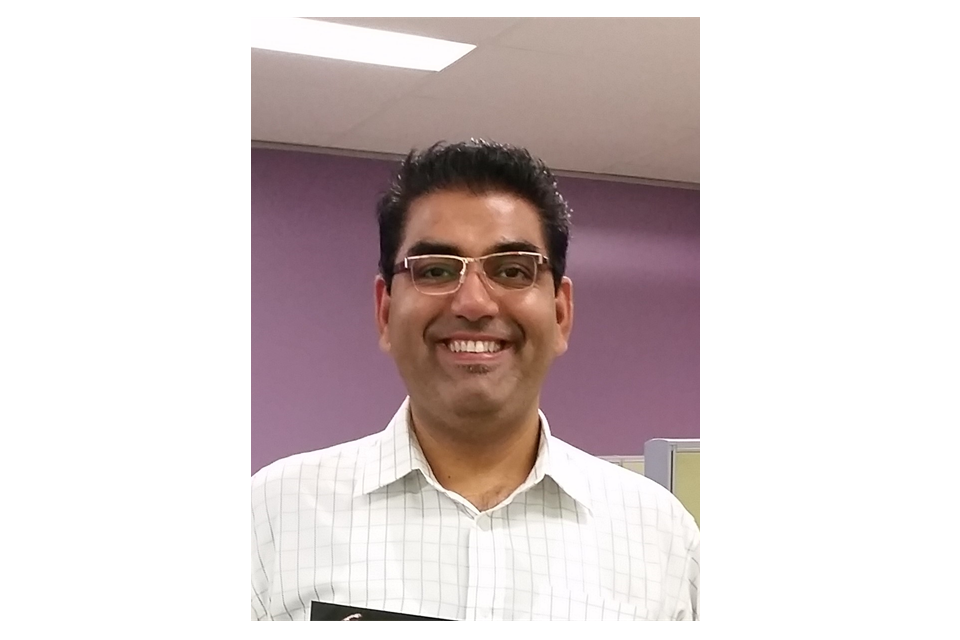 Ritesh smiling at the camera