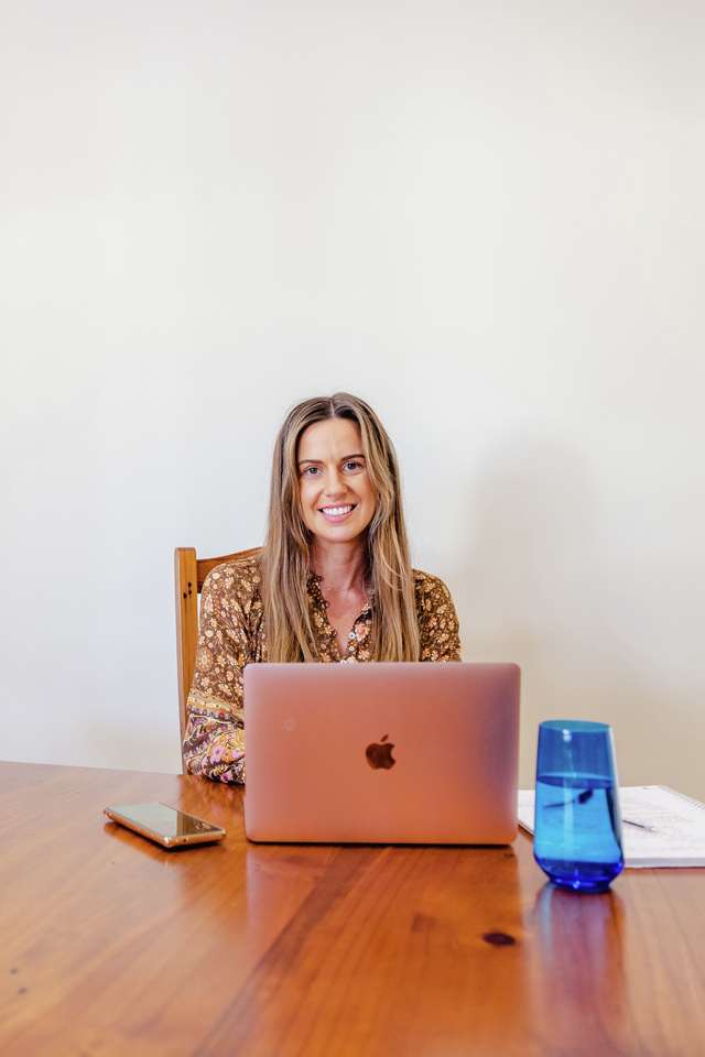 CQU student studies at a laptop at the dining table.