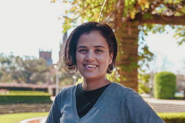 Karuna Shiwakoti posing in a Melbourne park