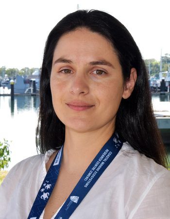 Headshot of Larissa Patricio Valerio with the Gladstone Harbour in the background
