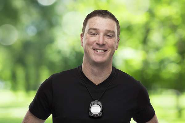 Liam Bromilow smiling bluer background