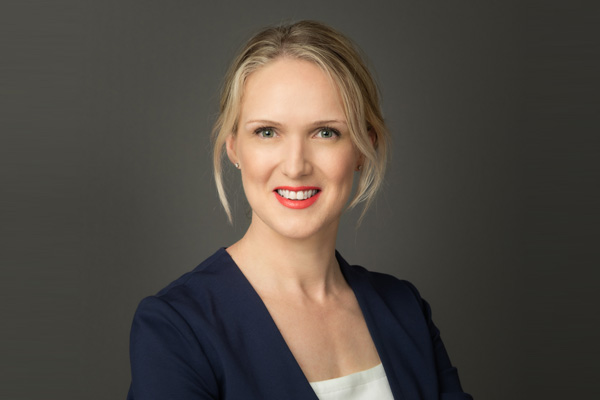 Head shot of Bethany Mackay, Chief Wellness Officer smiling