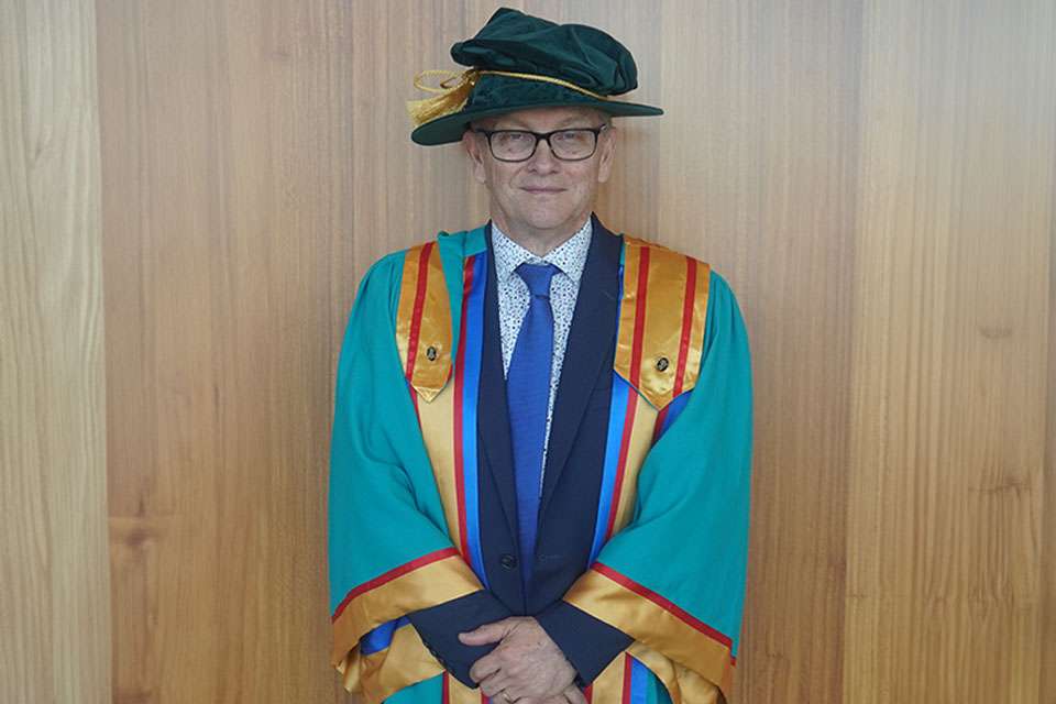 Man in academic regalia