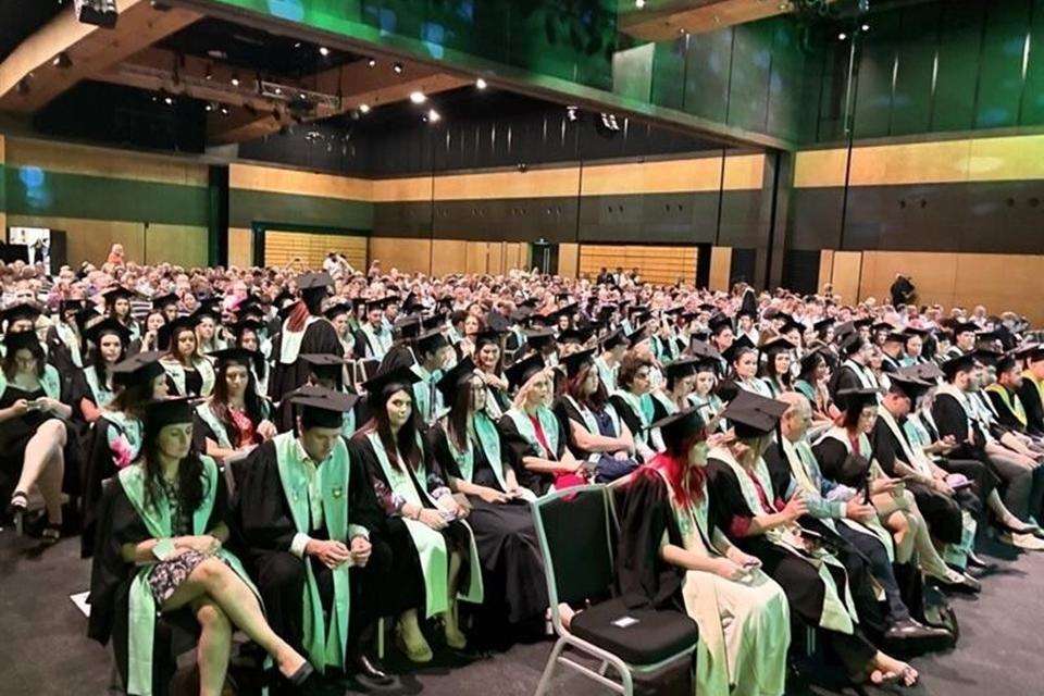 Group of Mackay graduates in regalia