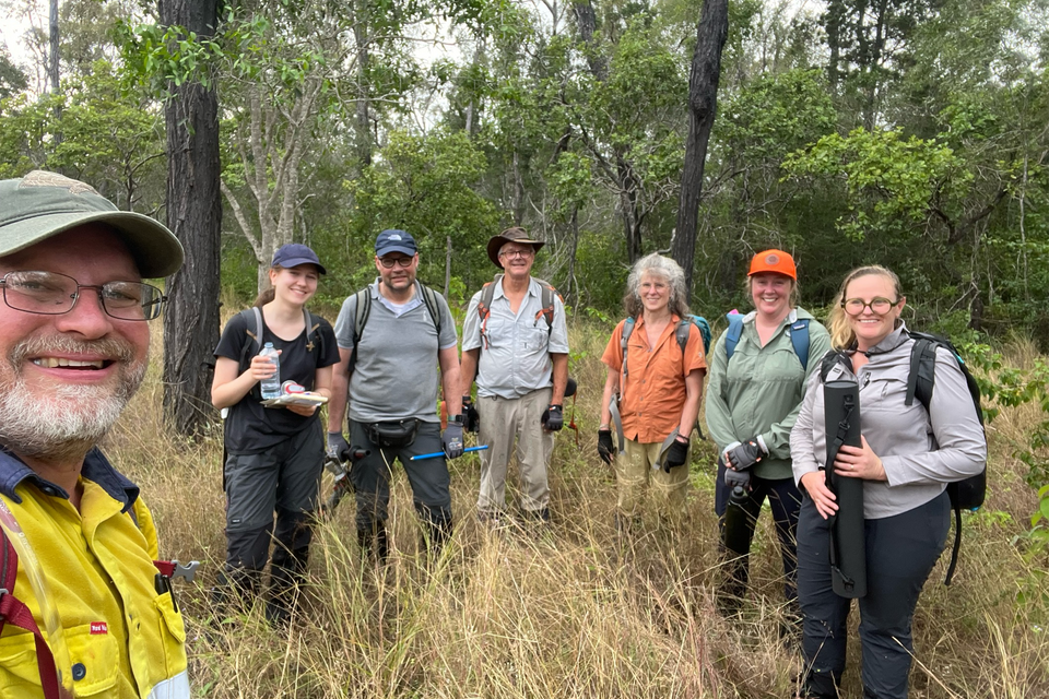 Group of people standing in bushland