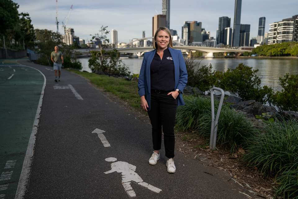 Woman standing on walking path