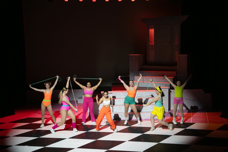 Group of women in fluro outfits