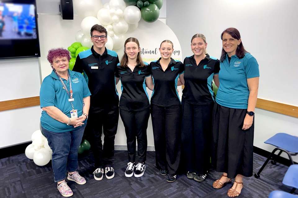Group of people smiling at camera