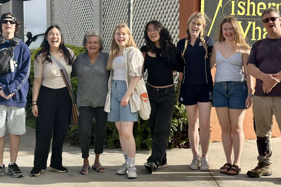 Line of people smiling at camera