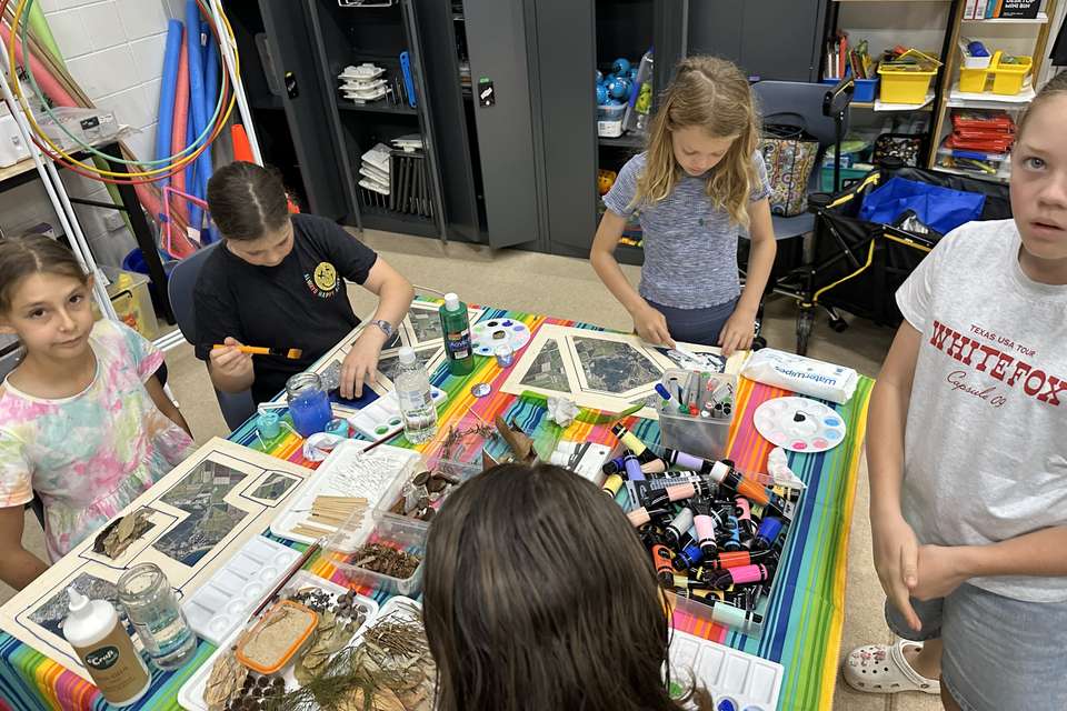 Group of girls with art supplies