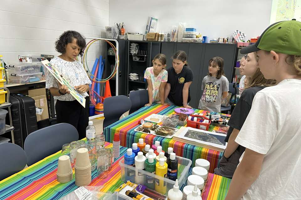 Woman teaching art class
