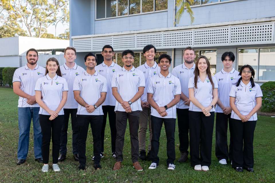 Chamika is pictured in the front centre among a group of fellow students in a group photo on the Bundaberg campus. All are wearing white RMP polo shirts.