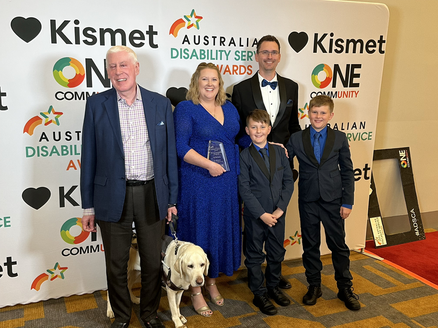 L-R: CQUniversity Chancellor Mr Graeme Innes AM, Sasha Job and her family