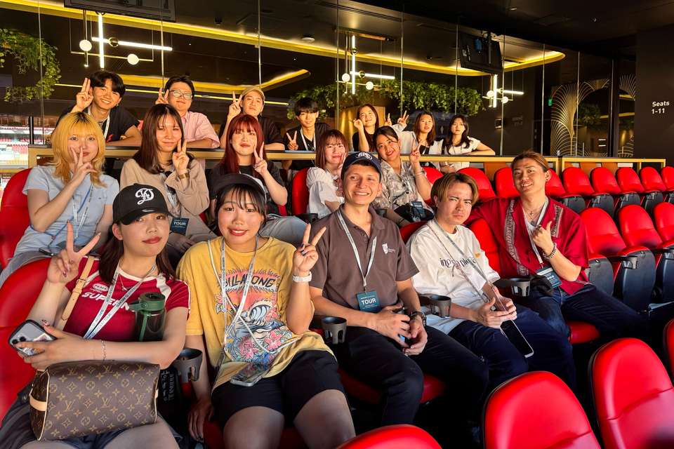 Japanese students at a football stadium in Brisbane