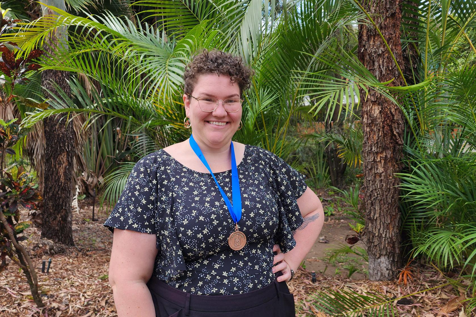 Kellie Webb wearing the 2023 School of Education and the Arts Medal around her neck