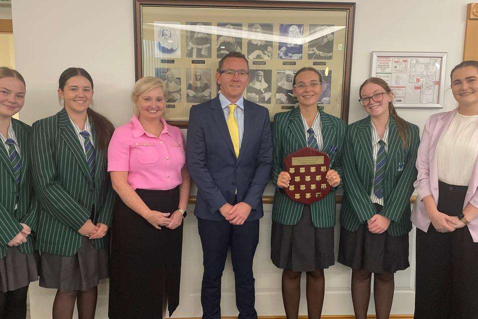 The Cathedral College students with their teacher, Paula Phelan of Phelan Family Law and CQU Law Lecturer Dr Lance Rundle