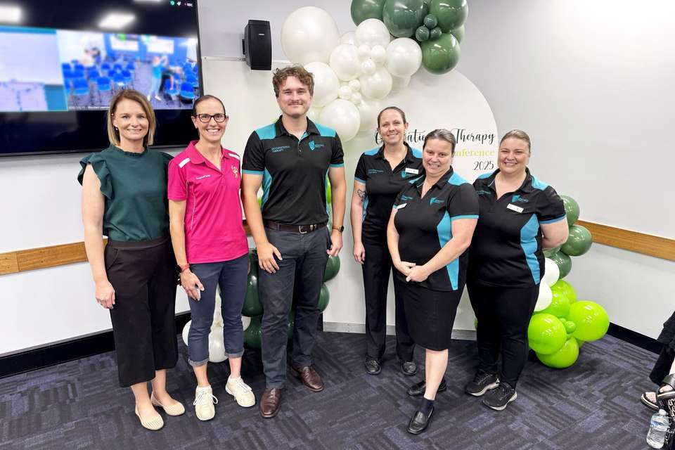 Group of people smiling at camera