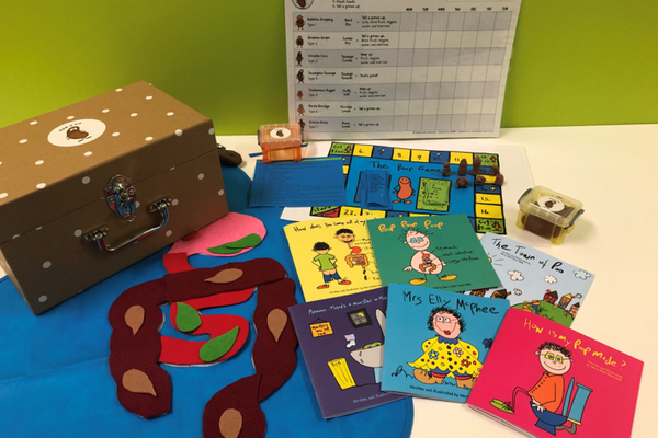 Poop it Kit resources sitting on a table