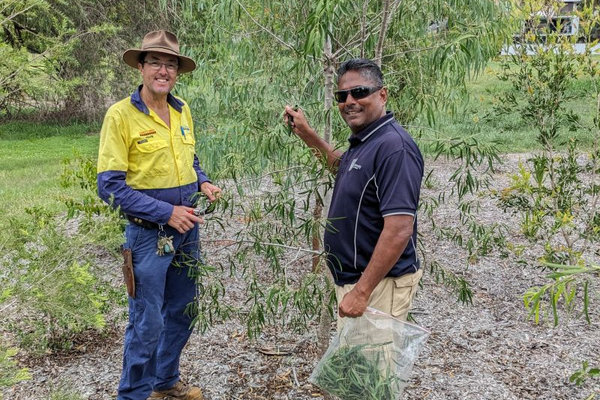 Kelvin from Rockhampton Regional Council with Mani Naiker standing in front of tree