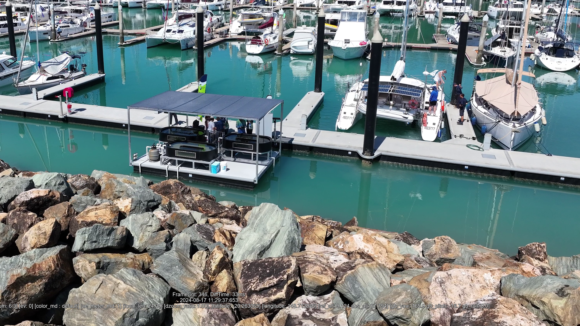 Aerial view of CMERC Airlie Beach Seagrass Nursery Launch in a marina