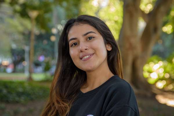 Thu Zar Linn smiling in a park