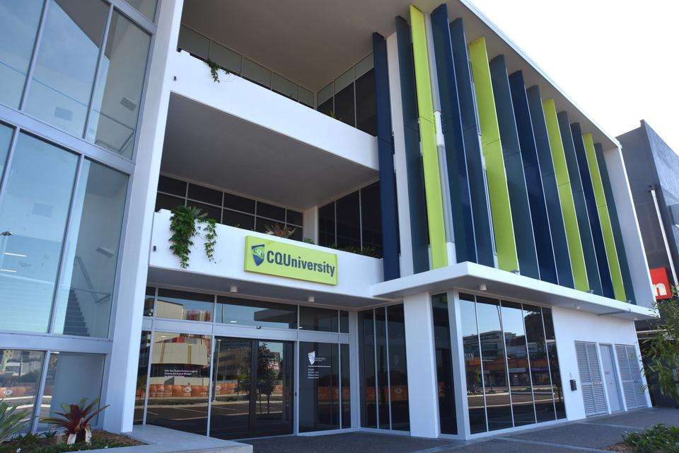 Townsville Campus entrance with blue and green shutters and plants