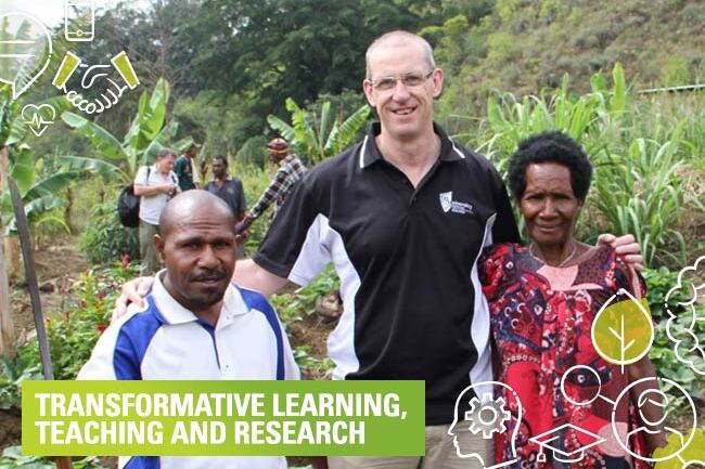 CQUni staff member Philip Brown with community members the CQU Social Innovation are helping